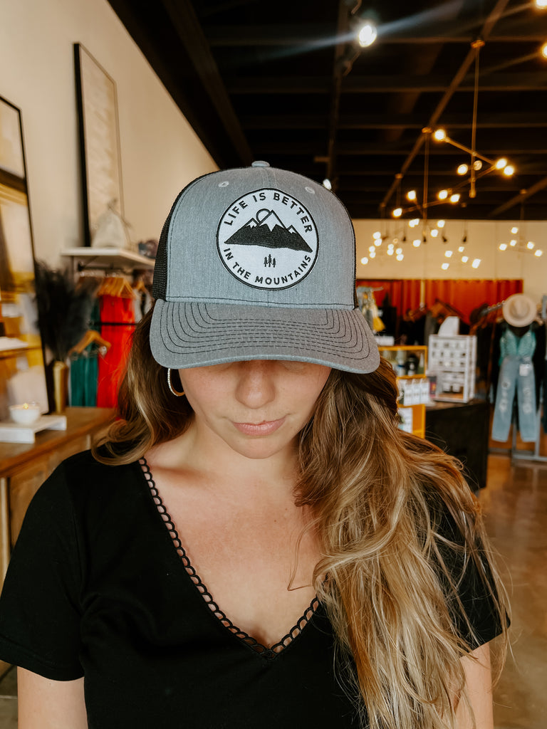 Better in the Mountains Trucker Hat